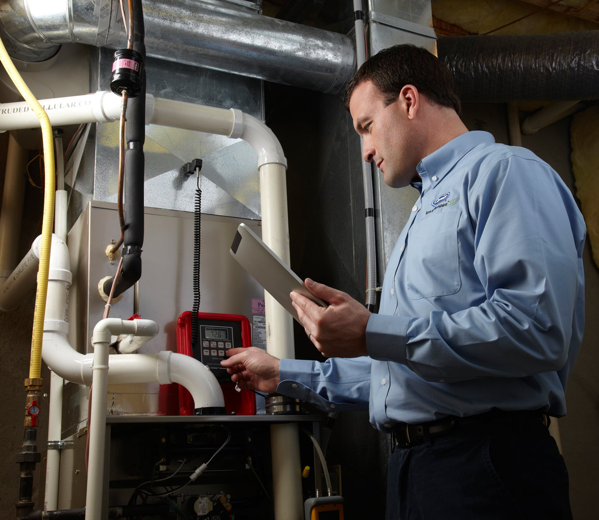 technition working on furnace