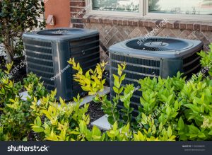 AC on the side of the house - stock photo